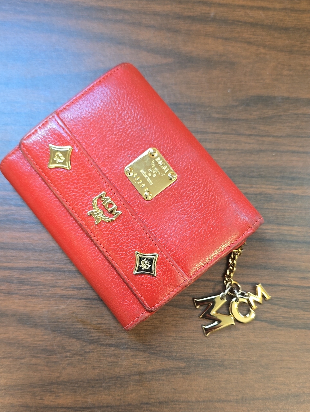 MCM Red Leather Compact Wallet with Gold Logo Charms